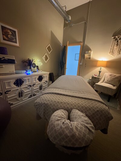 woman with hot stones on back - Massage Therapy in Sun Prairie WI Specific Health Massage Therapy
