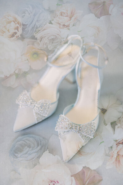 bella bell blue bridal shoes in a double exposure image with florals from the bouquet 