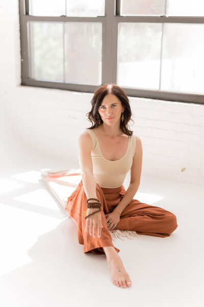 A portrait of a self love coach