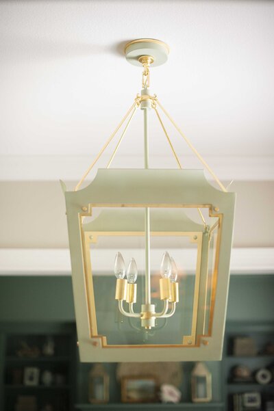 large green and gold pendant light