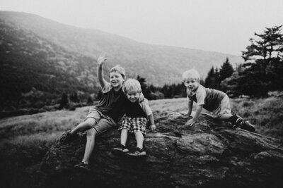 black and white photo of three children