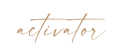 Activator written in brushed gold script font
