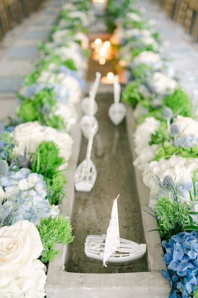 floating boats as a reception centerpiece