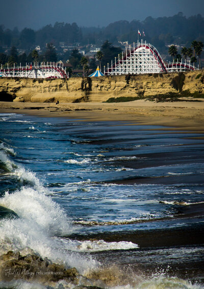 Santa Cruz Beach Boardwalk’s famous Giant Dipper roller coaster viewed from Seabright State Beach.
