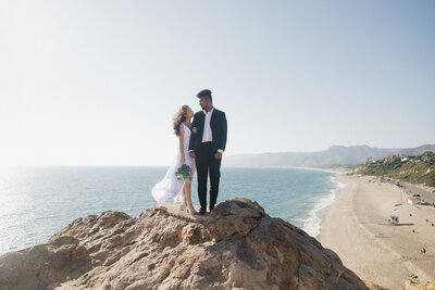 Couples portraits in Malibu, California at Point Dume overlooking the beach of the Pacific Ocean