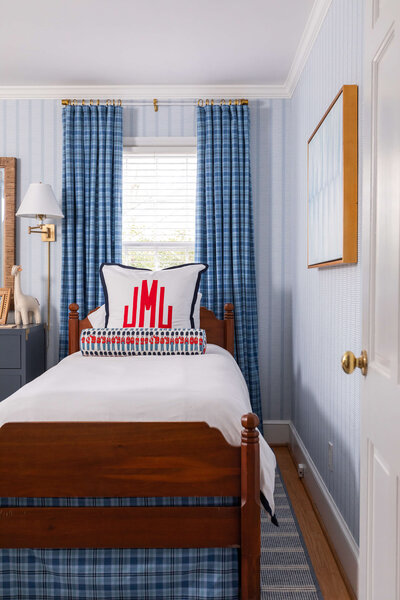 Boys bedroom with patterned curtains