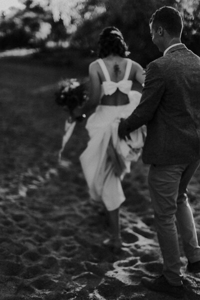Couple walking in the sand