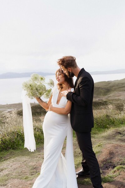 large white wedding cake at charlotte reception