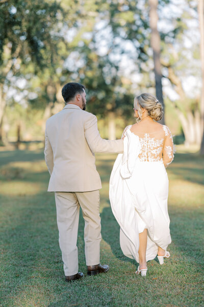 bride and groom walking together on their wedding day