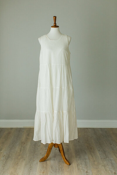 white tiered dress without sleeves