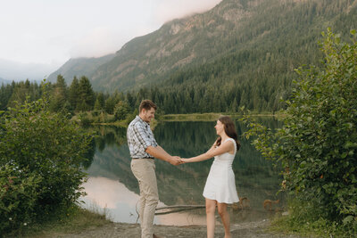 couple kissing in a lupine field