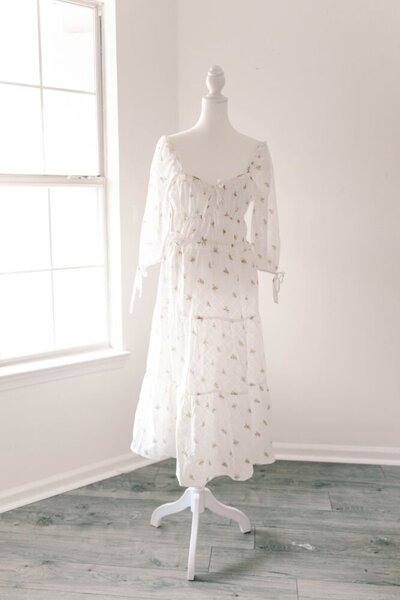 Women's white floral dress.