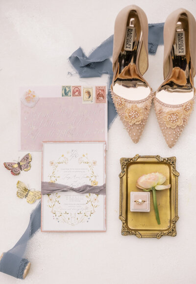 blue, blush, and gold wedding details
