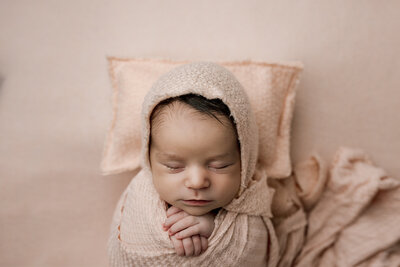 newborn baby girl in pink