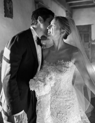 A couple embracing after their wedding ceremony in Santa Barbara, planned by Drake Social Events