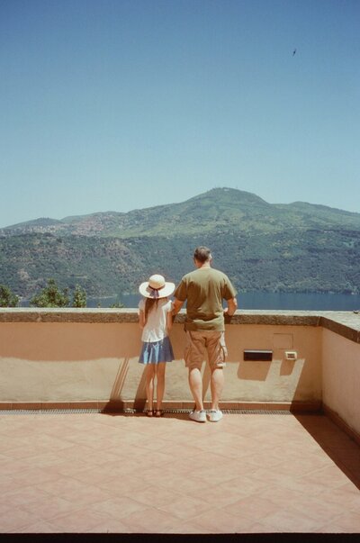 Father and daughter on overlook