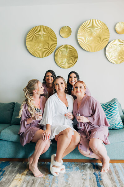 bride and bridesmaids getting ready