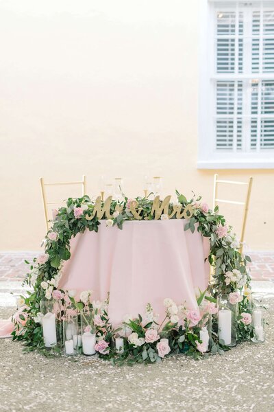 pink and white wedding reception sweetheart table