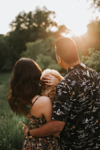 Candid moments from a sunset couples photoshoot in Peterborough park