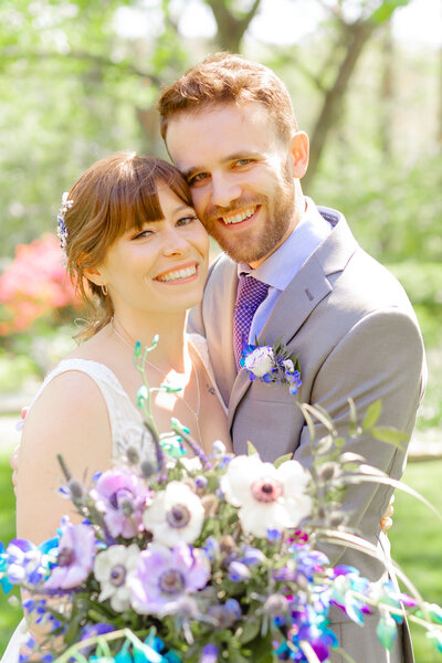 A couple canoodles under the Gramercy Mansion gazebo for Maryland Wedding Photographer