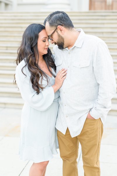 Bride and groom walk up memorial steps at their DC wedding