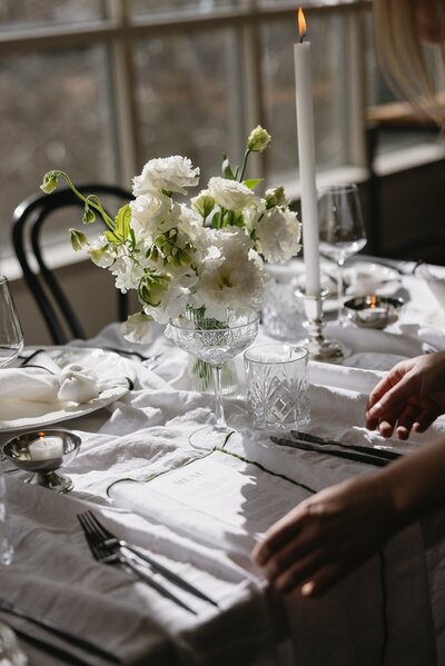 Wedding reception and elopement table with white flowers