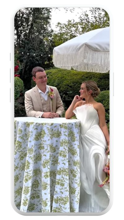 Photo of a phone mockup with a bride and groom in the phone
