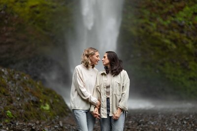 Happy elopement couple with Mount Rainier and a forest as a backdrop