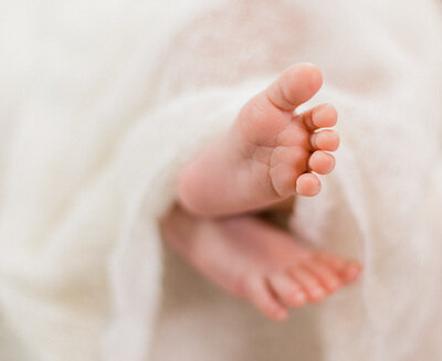close up of newborn's feet
