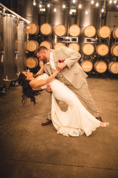 LaBelle Winery - Couple Portrait With Wine Barrels as Backdrop