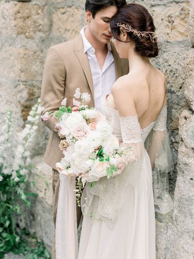 Bride and groom have a portrait together at La Badia di Orvieto by Fine Art Wedding  Photographer Michelle Wever Photography
