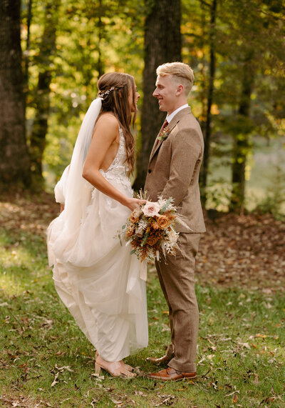 A bride and groom pose for their couples' portraits.