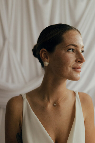 bride looks out window