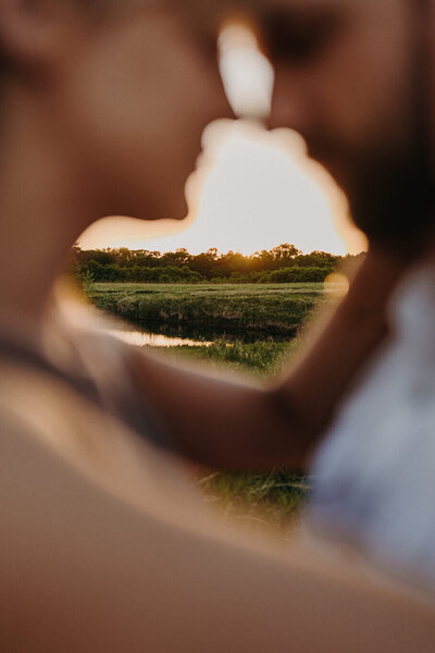 couple embracing during sunset