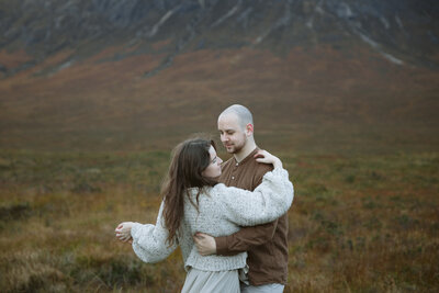 couple elope in glencoe and dance together as they think about their future