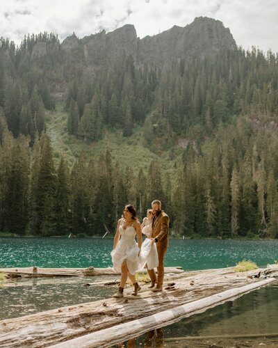 couple walking along water edge