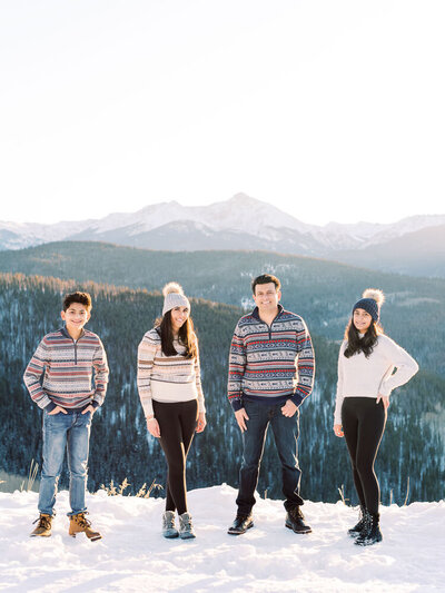 Mountaintop Family Photos in Vail, Colorado during Christmas ski vacation