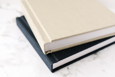 Navy and cream linen covered wedding photography albums