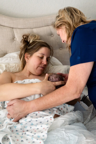 Joani Koenig provides breastfeeding support at homebirth in New Braunfels TX
