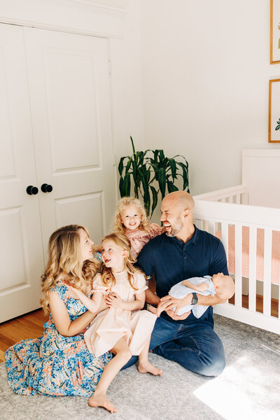 family with their children during a newborn session