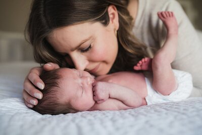 Mother and newborn baby during Seattle newborn photography session