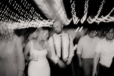 blurry moving photo of bride and groom dancing on the dance floor at the wedding day in wichita kansas