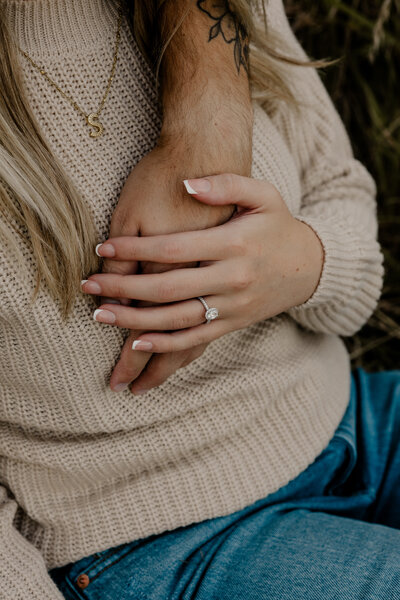 Romantic Omaha engagement session during the fall, captured by Tori Nichole Photography. The couple is surrounded by vibrant autumn foliage and golden light, creating warm, timeless moments. A perfect blend of natural beauty and authentic connection, showcasing the magic of the season and their love story.