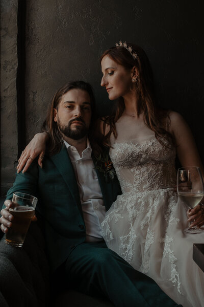 bride and groom embracing at reception
