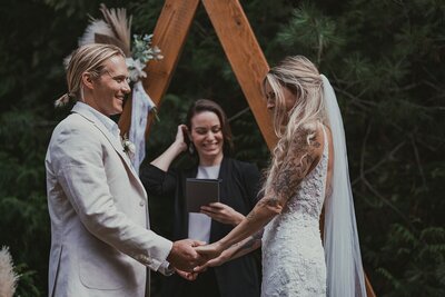 Groom and bridesmaids high-five