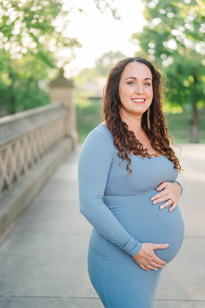 Bride and groom stand in front of Whitehall wedding venue in Louisville