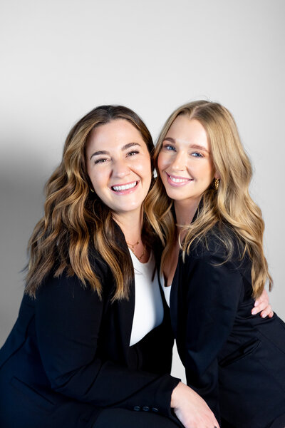two girls looking at the camera