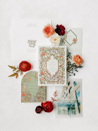 Flat lat of a modern wedding invitation with autumn color flower heads for a wedding held at The Hewing Hotel in Minneapolis Minnesota.