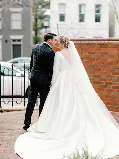 Bride and Groom portraits by a fountain in Maryland venue