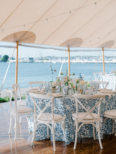 tented wedding reception table with patterned table cloth